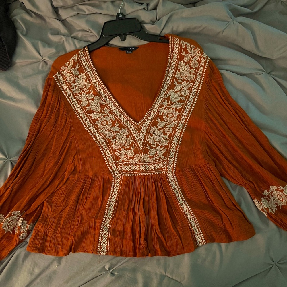 American eagle dress top. Size medium worn 2 times. It is a rust orange color.
